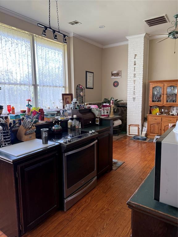 342532 E 1020th Rd, Meeker, OK 74855 - office with ornamental molding, wood finished floors, and a ceiling fan