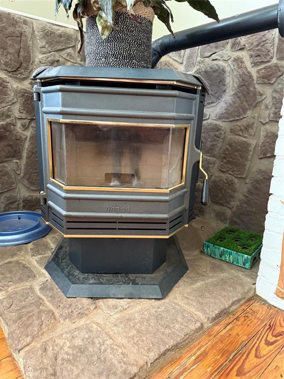 342532 E 1020th Rd, Meeker, OK 74855 - detailed view of a wood stove