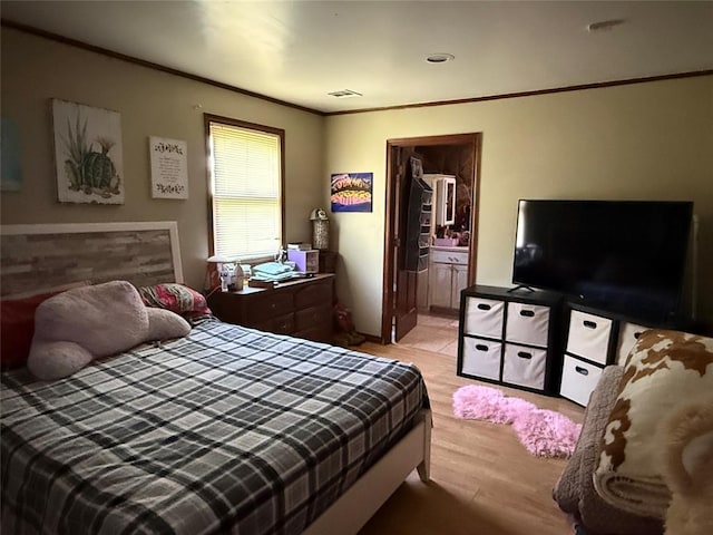 342532 E 1020th Rd, Meeker, OK 74855 - bedroom with crown molding and wood finished floors