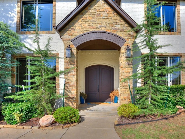 4109 Slate Bridge Rd, Edmond, OK 73034 - property entrance featuring brick siding