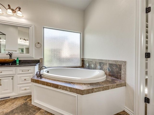 4109 Slate Bridge Rd, Edmond, OK 73034 - full bathroom featuring vanity and a garden tub