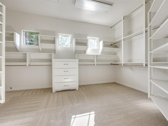 4109 Slate Bridge Rd, Edmond, OK 73034 - walk in closet featuring carpet