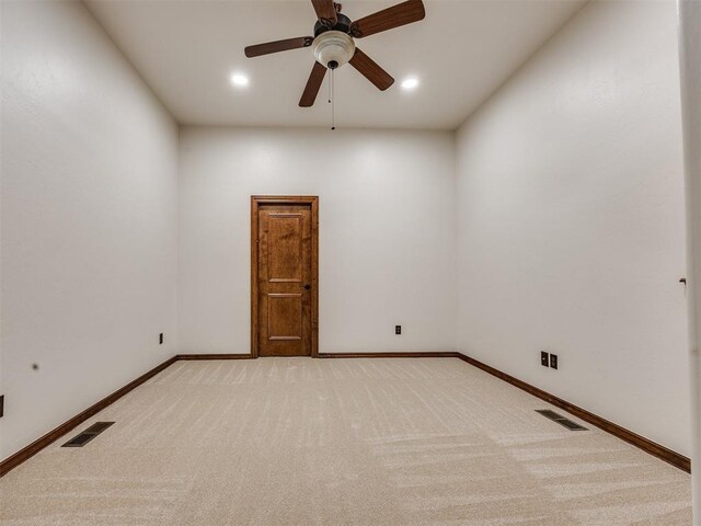 4109 Slate Bridge Rd, Edmond, OK 73034 - empty room with light carpet, a ceiling fan, and recessed lighting