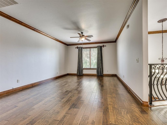 4109 Slate Bridge Rd, Edmond, OK 73034 - spare room featuring ceiling fan, dark wood finished floors, and crown molding