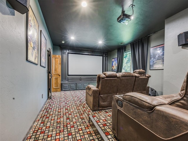 4109 Slate Bridge Rd, Edmond, OK 73034 - cinema with a textured wall, recessed lighting, and carpet