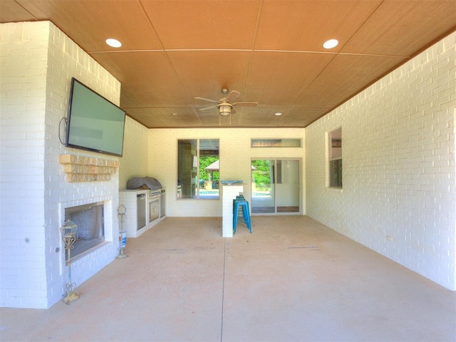 4109 Slate Bridge Rd, Edmond, OK 73034 - view of patio / terrace with exterior kitchen and a ceiling fan