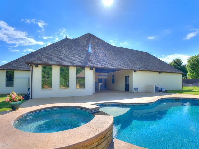 4109 Slate Bridge Rd, Edmond, OK 73034 - view of pool featuring a patio area and a pool with connected hot tub