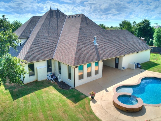 4109 Slate Bridge Rd, Edmond, OK 73034 - back of property featuring stucco siding, roof with shingles, and a patio area