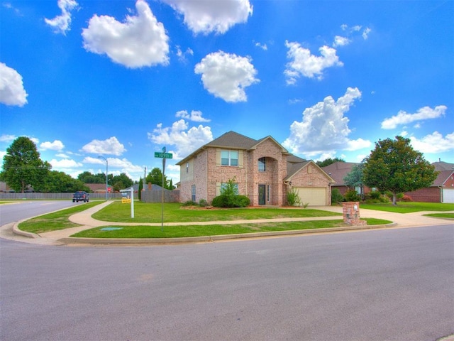 7300 NW 109th St, Oklahoma City, OK 73162 - traditional-style home with brick siding, concrete driveway, and an attached garage