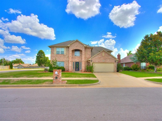 7300 NW 109th St, Oklahoma City, OK 73162 - traditional-style house with a garage, concrete driveway, a front lawn, and brick siding