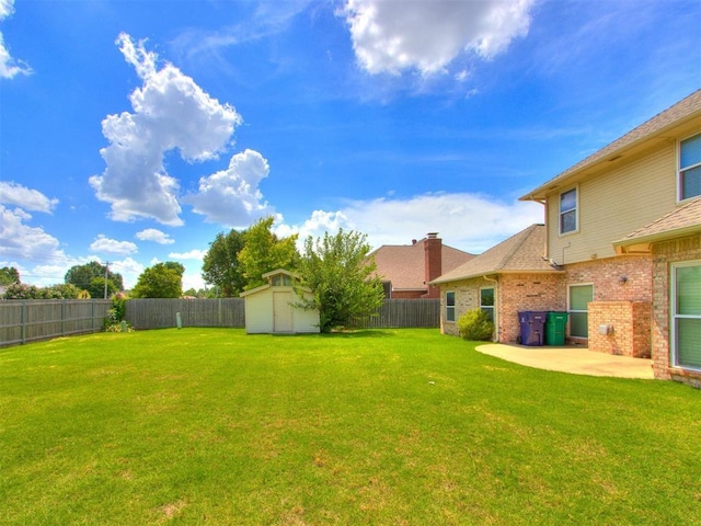 7300 NW 109th St, Oklahoma City, OK 73162 - fenced backyard featuring a storage unit and a patio area