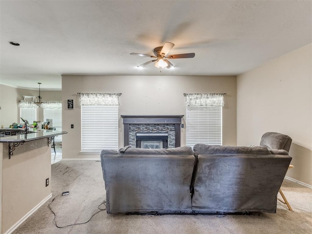 7300 NW 109th St, Oklahoma City, OK 73162 - living room with a ceiling fan, a fireplace, and light carpet