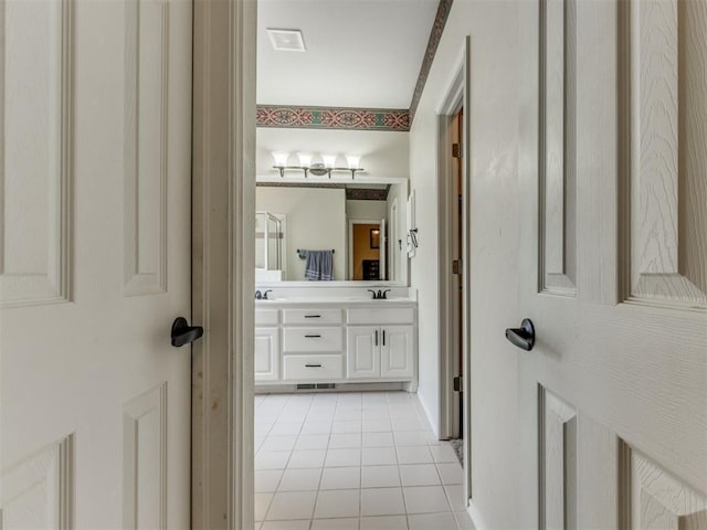 7300 NW 109th St, Oklahoma City, OK 73162 - full bathroom with tile patterned flooring and double vanity
