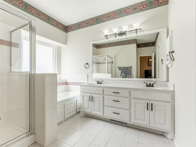 7300 NW 109th St, Oklahoma City, OK 73162 - full bath with a shower stall, a bath, double vanity, and tile patterned flooring