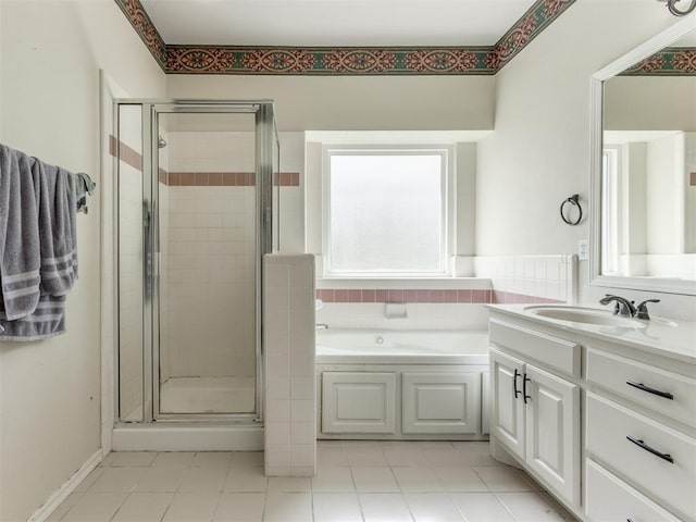 7300 NW 109th St, Oklahoma City, OK 73162 - full bath featuring a stall shower, a bath, vanity, and tile patterned floors