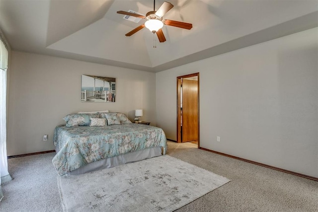 3000 Hampshire Ln, Oklahoma City, OK 73179 - carpeted bedroom with a raised ceiling and ceiling fan