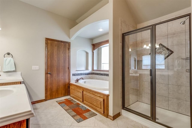 3000 Hampshire Ln, Oklahoma City, OK 73179 - bathroom featuring a bath, a shower stall, vanity, tile patterned flooring, and lofted ceiling