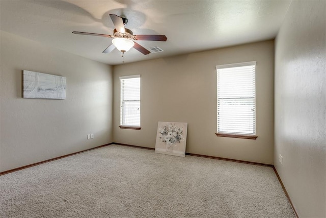 3000 Hampshire Ln, Oklahoma City, OK 73179 - empty room with carpet flooring and a ceiling fan