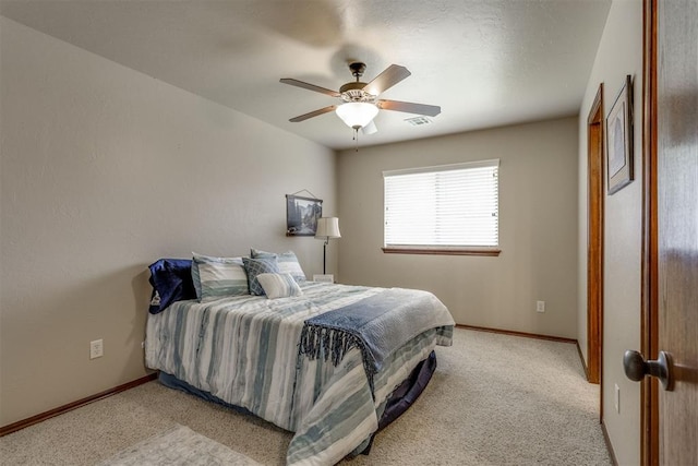 3000 Hampshire Ln, Oklahoma City, OK 73179 - bedroom with light colored carpet and a ceiling fan