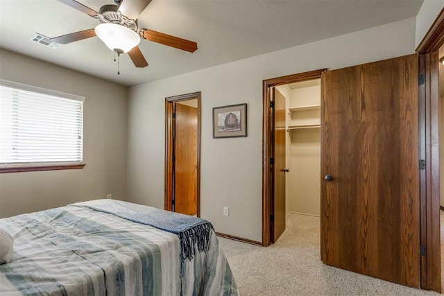3000 Hampshire Ln, Oklahoma City, OK 73179 - bedroom featuring light carpet, a spacious closet, a closet, and ceiling fan