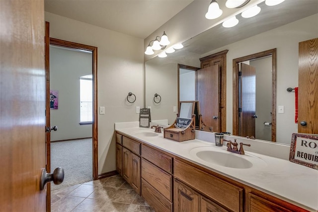 3000 Hampshire Ln, Oklahoma City, OK 73179 - bathroom with double vanity and tile patterned floors
