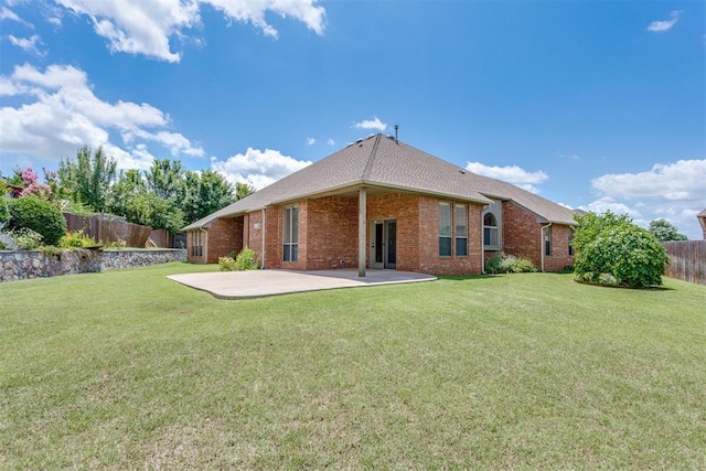 3000 Hampshire Ln, Oklahoma City, OK 73179 - rear view of property featuring a patio area, brick siding, and roof with shingles