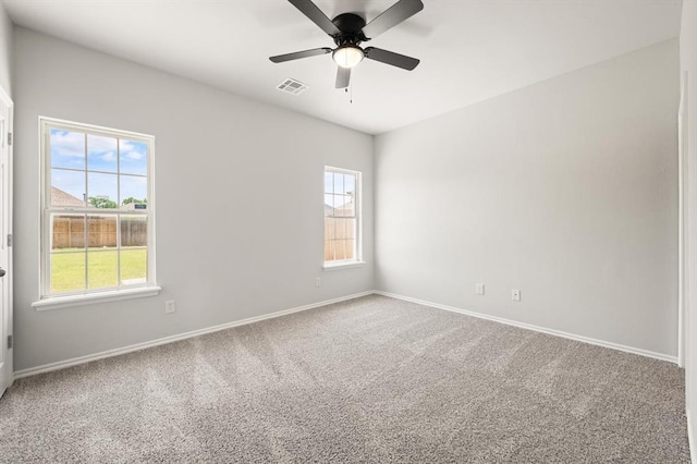 5916 SE 70th St, Oklahoma City, OK 73135 - carpeted empty room with baseboards and a ceiling fan