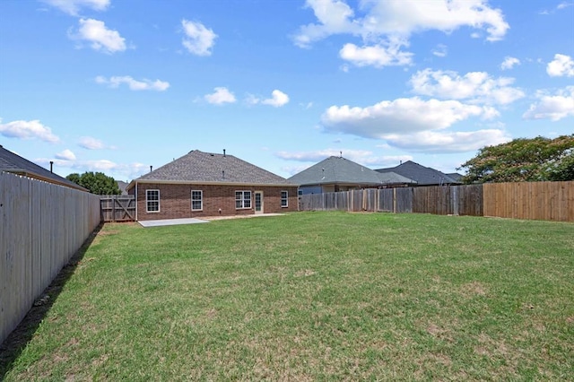 5916 SE 70th St, Oklahoma City, OK 73135 - fenced backyard featuring a patio area