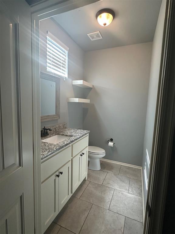 5024 SW 130th St, Oklahoma City, OK 73173 - bathroom featuring vanity and tile patterned flooring