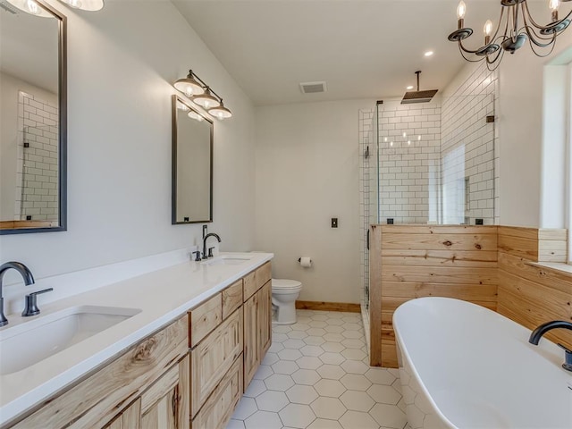 29490 County Road 180th Rd, Stillwater, OK 74075 - full bathroom with a stall shower, a freestanding bath, double vanity, recessed lighting, and tile patterned flooring