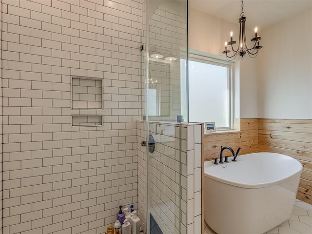 29490 County Road 180th Rd, Stillwater, OK 74075 - full bath with a shower stall, a freestanding bath, a wainscoted wall, and a chandelier