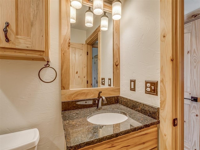 29490 County Road 180th Rd, Stillwater, OK 74075 - bathroom featuring vanity and a textured wall
