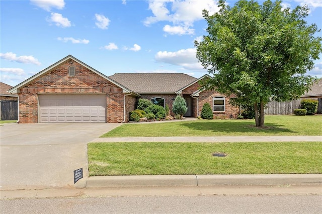 3008 Fairway Dr, Weatherford, OK 73096 - view of front of house featuring an attached garage, driveway, and brick siding
