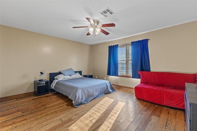 3008 Fairway Dr, Weatherford, OK 73096 - bedroom featuring hardwood / wood-style floors and a ceiling fan