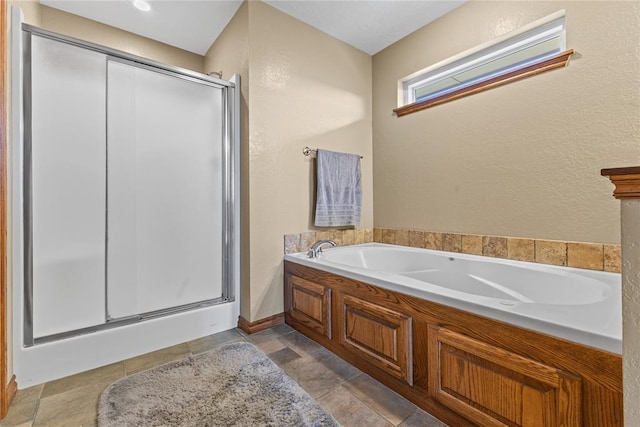 3008 Fairway Dr, Weatherford, OK 73096 - bathroom featuring a stall shower and a bath