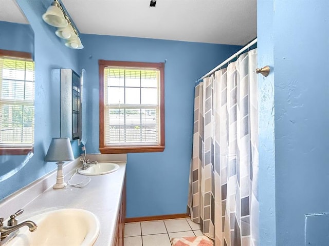 521 E Broadway St, Lexington, OK 73051 - full bath featuring tile patterned floors and double vanity