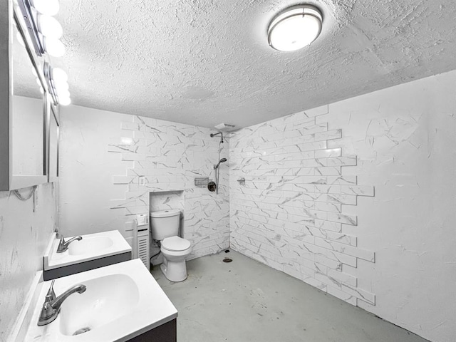 521 E Broadway St, Lexington, OK 73051 - bathroom with vanity, concrete flooring, a shower, and a textured ceiling