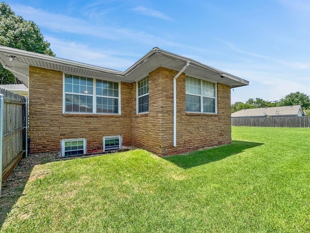521 E Broadway St, Lexington, OK 73051 - view of home's exterior featuring stone siding
