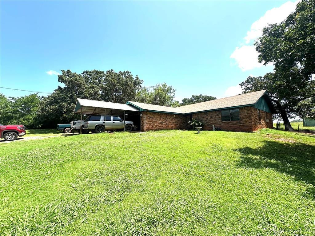 28197 Buck Townes Rd, Macomb, OK 74852 - ranch-style house with a front yard