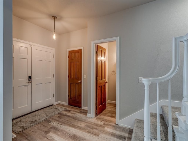 11300 N Pennsylvania Ave Unit 120, Oklahoma City, OK 73120 - entrance foyer with light wood finished floors and stairs