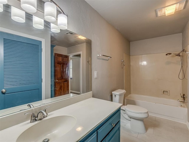 11300 N Pennsylvania Ave Unit 120, Oklahoma City, OK 73120 - full bath with vanity, bathing tub / shower combination, tile patterned floors, and a textured wall