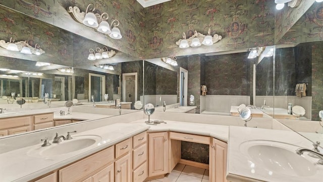 704 Capri Pl, Edmond, OK 73034 - full bathroom with wallpapered walls, vanity, and tile patterned floors
