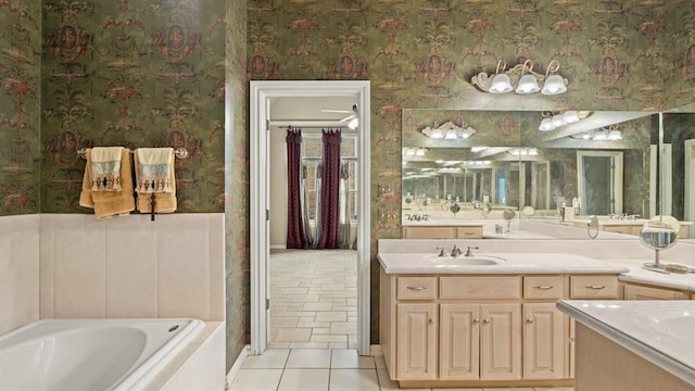 704 Capri Pl, Edmond, OK 73034 - full bath with wallpapered walls, vanity, tile patterned flooring, and a bath