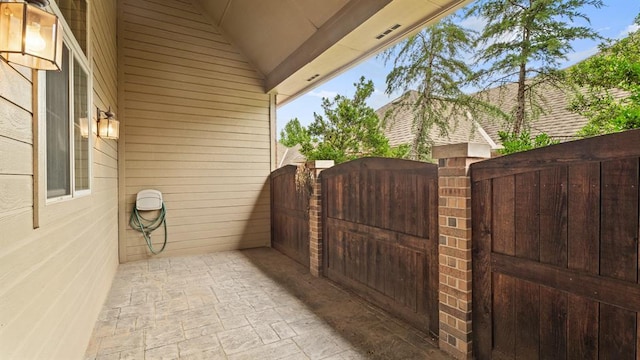 704 Capri Pl, Edmond, OK 73034 - view of patio with a gate