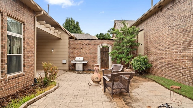 704 Capri Pl, Edmond, OK 73034 - view of patio / terrace featuring a grill