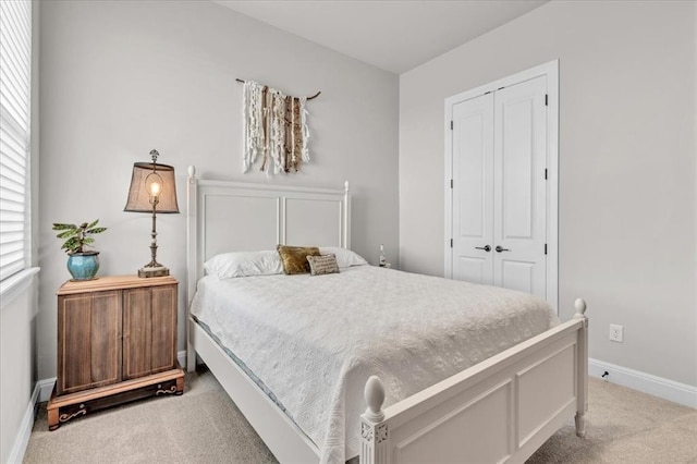 2033 Marsala Dr, Edmond, OK 73034 - bedroom featuring light carpet and a closet