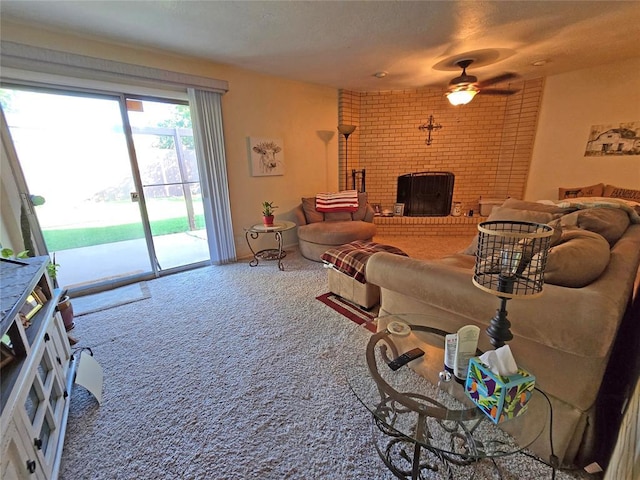 5712 Lawson Ln, Oklahoma City, OK 73132 - living room featuring ceiling fan, carpet, and a brick fireplace