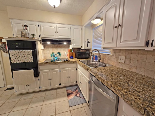 5712 Lawson Ln, Oklahoma City, OK 73132 - kitchen featuring black appliances, under cabinet range hood, decorative backsplash, white cabinets, and tile countertops