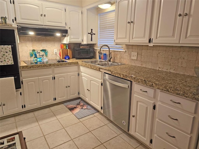 5712 Lawson Ln, Oklahoma City, OK 73132 - kitchen with black appliances, range hood, decorative backsplash, white cabinets, and light tile patterned floors