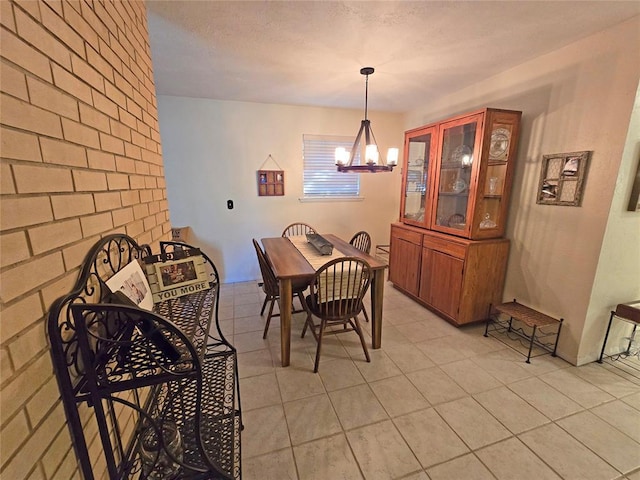 5712 Lawson Ln, Oklahoma City, OK 73132 - dining space with a chandelier and light tile patterned flooring